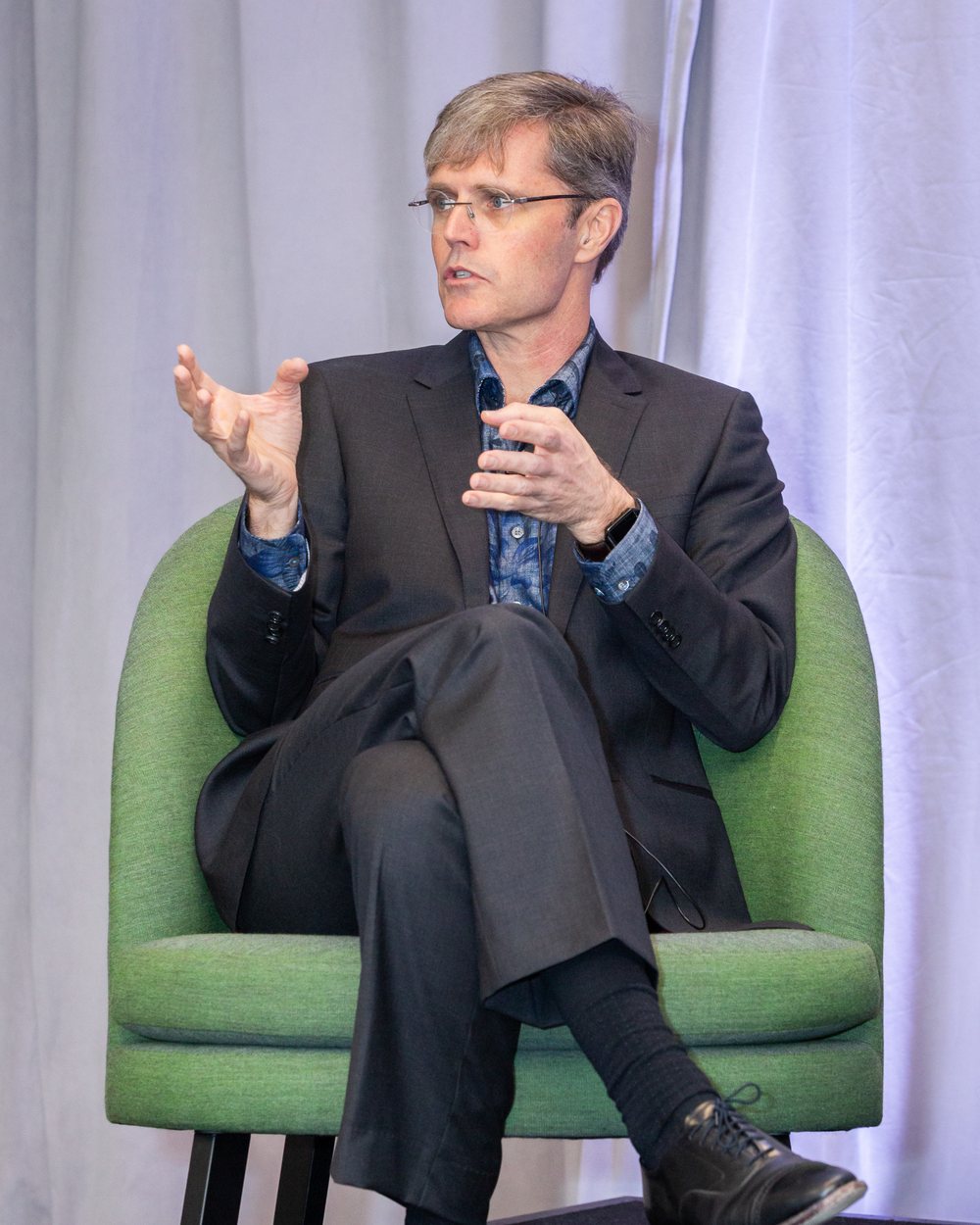 Dr. Morehead speaking on stage