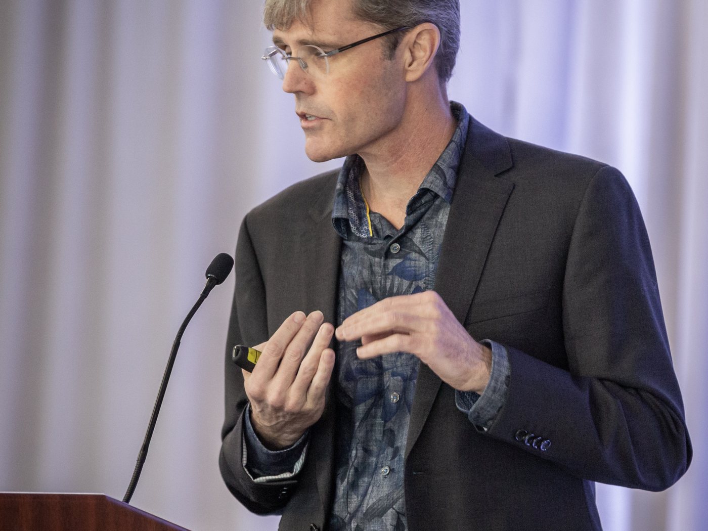 Dr. Morehead speaking at a lectern
